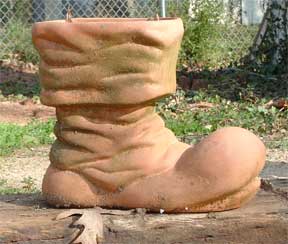 unique clay planter that looks like a boot